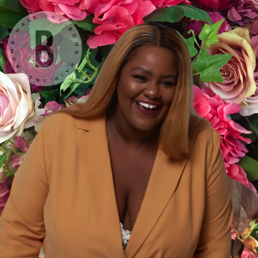 Fall Floral background with beautiful black woman in fashionable mustard blazer smiling and blonde Bomb Hair Inc Extensions